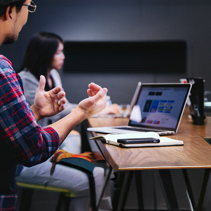 man talking in a meeting
